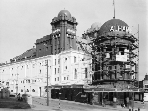 The outside of the Alhambra Theatre painted brown during World War 2 with scaffolding around the front.